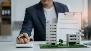 Business Man holding Pen