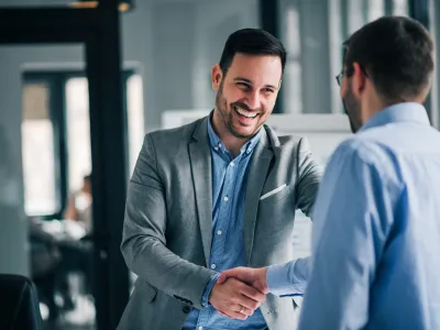 Two professional men shaking hands