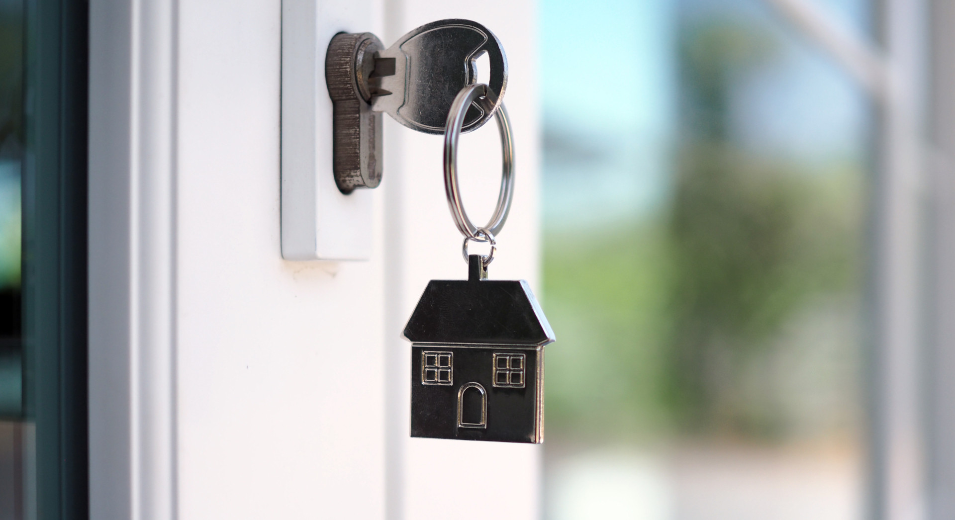 House key in front door lock