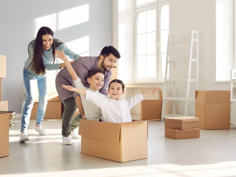 Happy family moving into new home