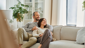 Middle Age Couple On Couch
