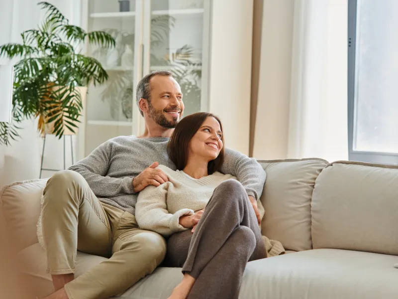Middle Age Couple On Couch