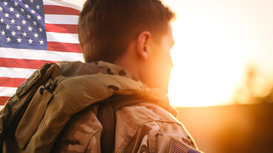 U.S. Veteran looking at sunset