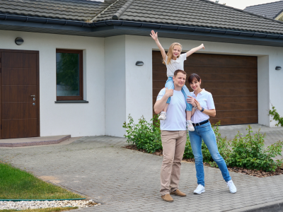 Happy Family in front of House