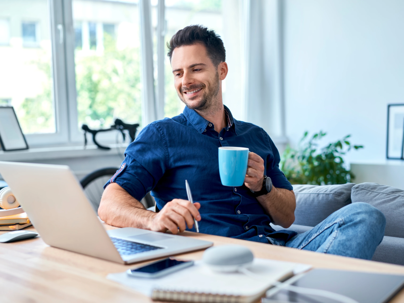 Man working from home with laptop computer