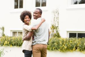 Happy Young Couple Buying their First Home