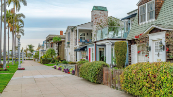 Tree lined Row of Homes near the Beach