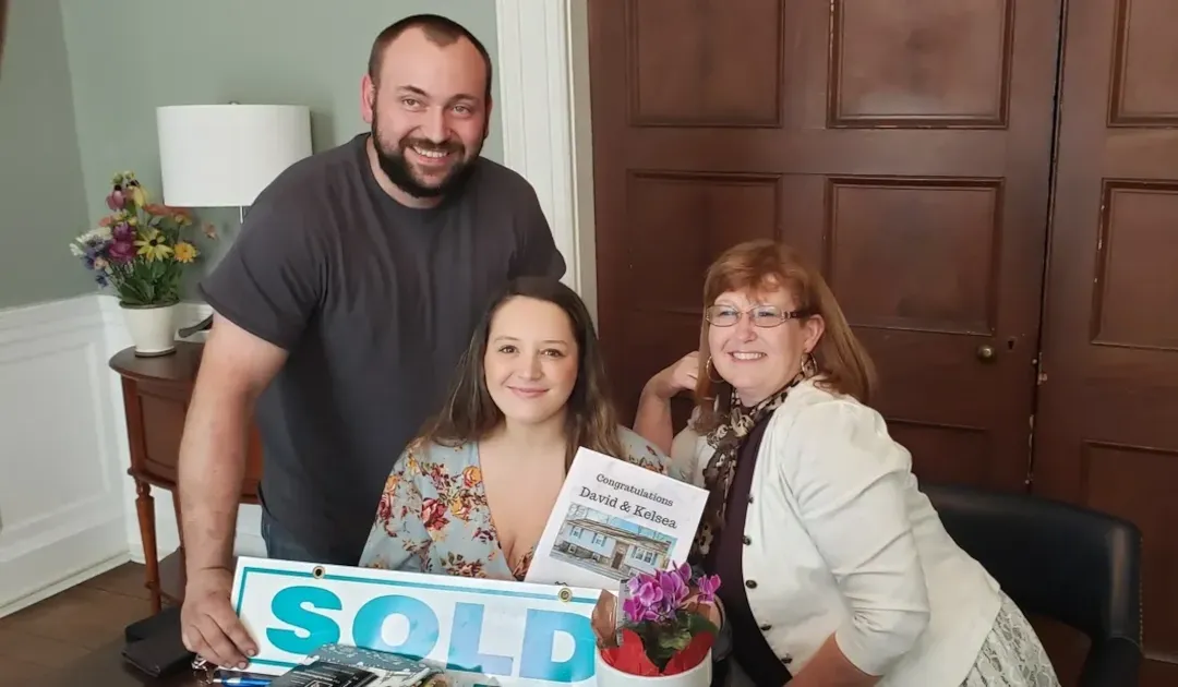 Happy Couple with Realtor