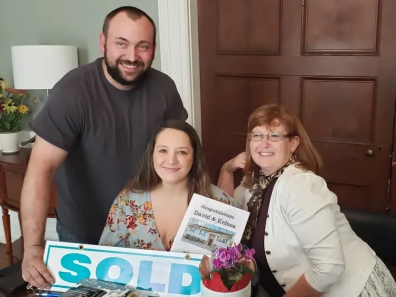 Happy Couple with Realtor