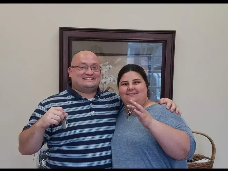 Happy Couple with Keys