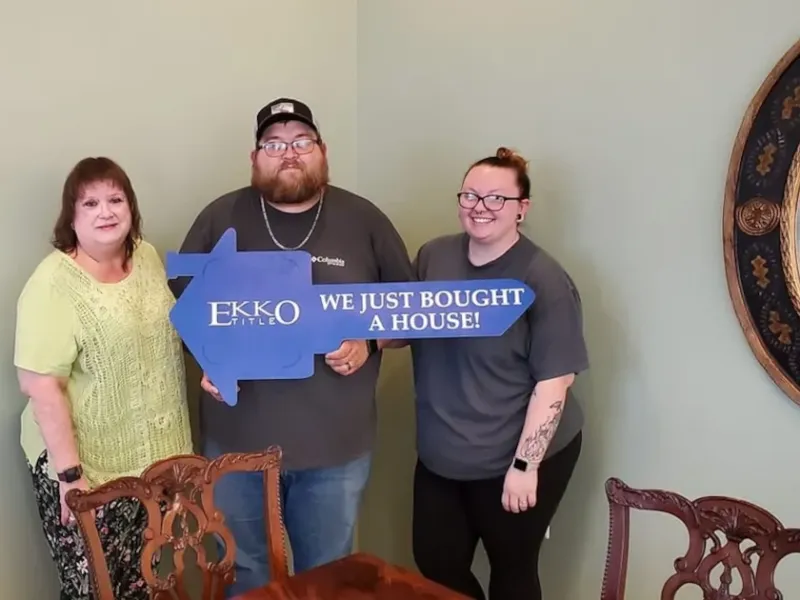 Happy Couple with a realtor