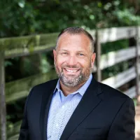 John D. Norwood, III Founder and President