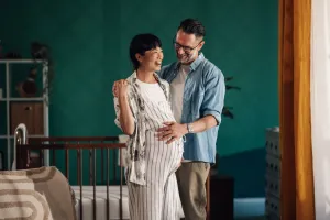 happy couple moving in to new home